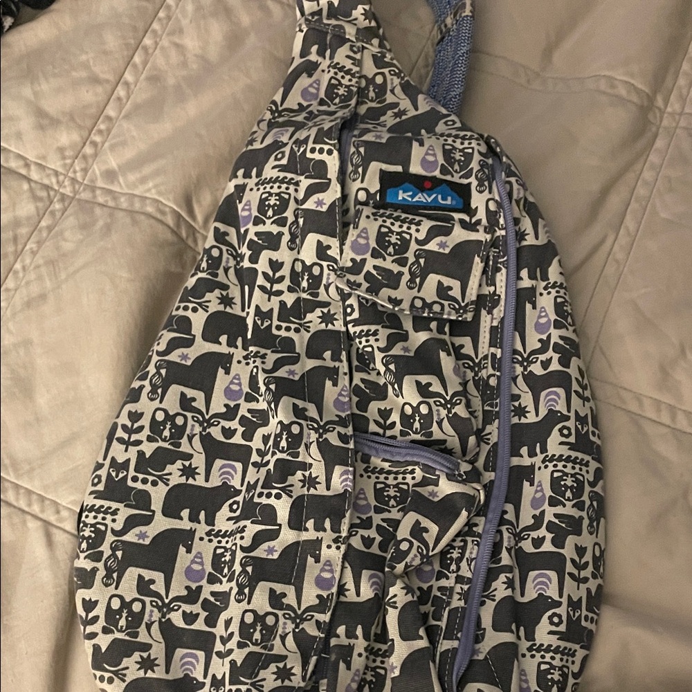 KAVU Animal Print Sling Bag in Black and Purple